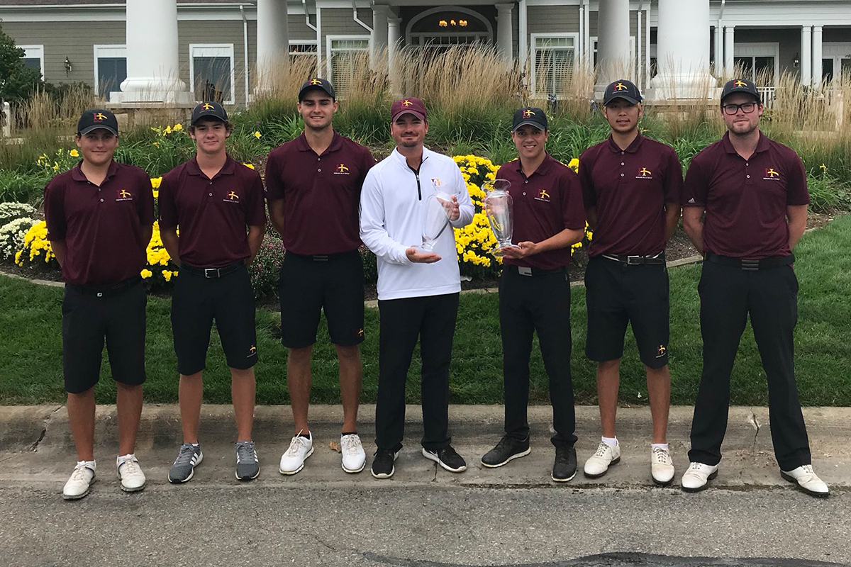 2017-18 IHCC Golf Team and Coach Weant holding trophies won at today's game!