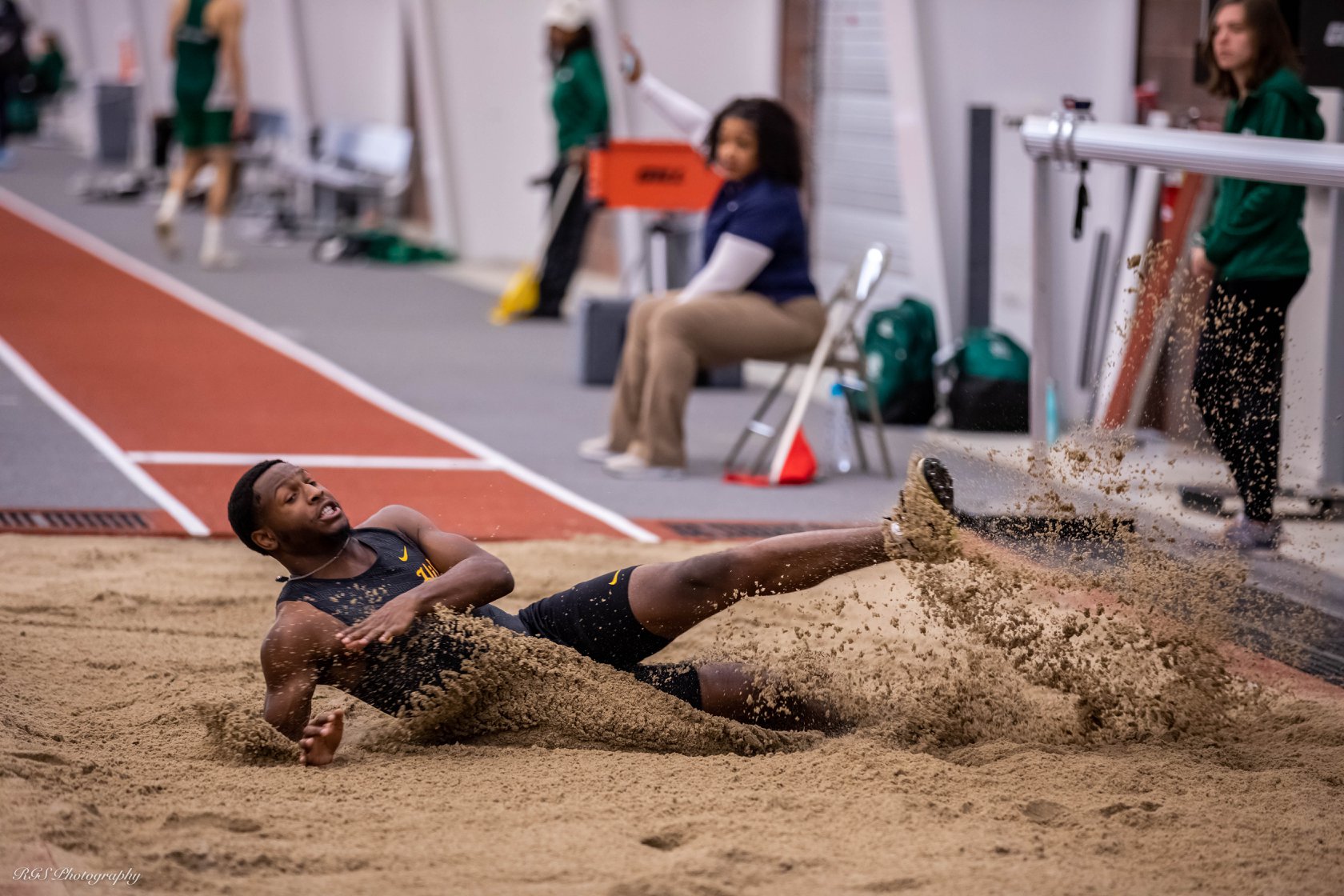 Freshman Tyler Pouncy leaps to a school-record in the long jump at the Jack Jennett Open on Friday.