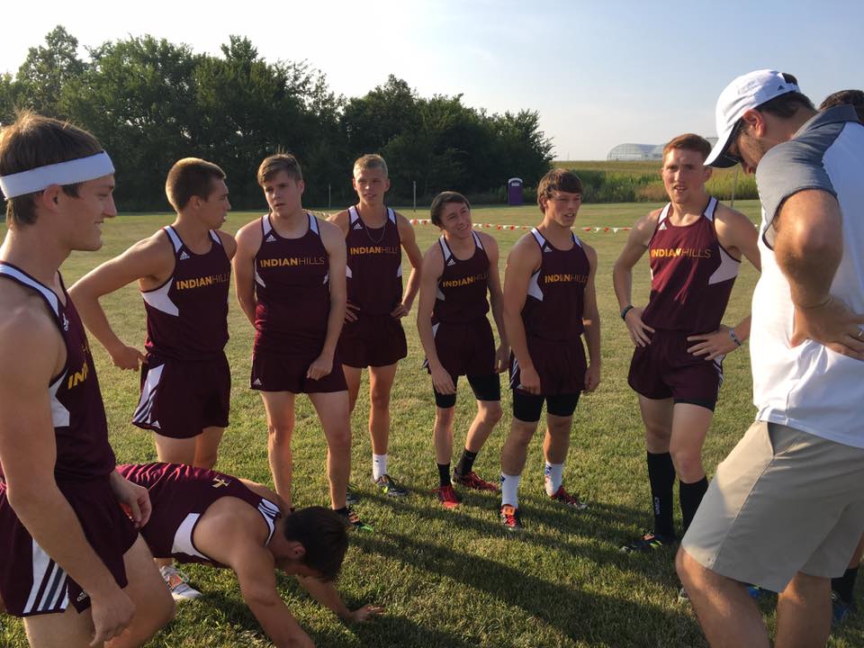 Men's Cross Country Team standing around talking after the meet.